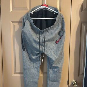 Nike Gray Joggers with Pink Swoosh